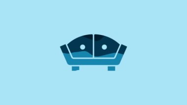 Blue Sofa icon isolated on blue background. 4K Video motion graphic animation .