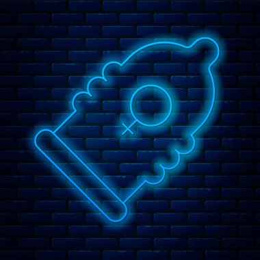 Parlayan neon hattı prezervatif güvenli seks ikonu tuğla duvar arka planında izole edilmiş. Güvenli aşk sembolü. Erkekler için doğum kontrol yöntemi. Vektör.