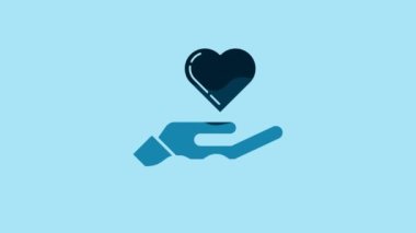 Blue Heart on hand icon isolated on blue background. Hand giving love symbol. 4K Video motion graphic animation.