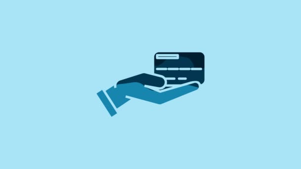Blue Human Hand Holding Credit Card Icon Isolated Blue Background — стоковое видео