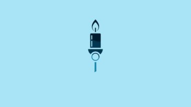 Blue Burning candle in candlestick icon isolated on blue background. Old fashioned lit candle. Cylindrical candle stick with burning flame. 4K Video motion graphic animation.