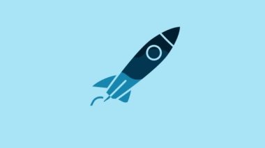 Blue Rocket ship with fire icon isolated on blue background. Space travel. 4K Video motion graphic animation.