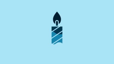 Blue Burning candle in candlestick icon isolated on blue background. Cylindrical candle stick with burning flame. 4K Video motion graphic animation.