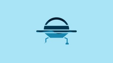 Blue UFO flying spaceship icon isolated on blue background. Flying saucer. Alien space ship. Futuristic unknown flying object. 4K Video motion graphic animation.