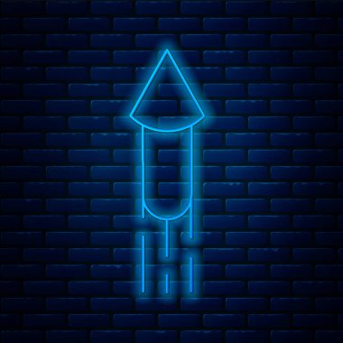 Parlayan neon hattı Firework roket ikonu tuğla duvar arka planında izole edildi. Eğlence partisi anlayışı. Patlayıcı havai fişek sembolü. Vektör.