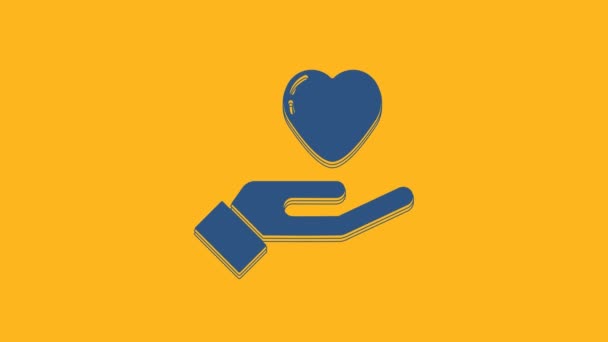 Corazón Azul Mano Icono Aislado Sobre Fondo Naranja Mano Dando — Vídeos de Stock