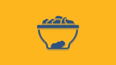Blue Date fruit in bowl icon isolated on orange background. 4K Video motion graphic animation.