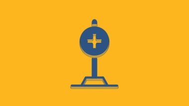 Blue Medical map pointer with cross hospital icon isolated on orange background. 4K Video motion graphic animation.