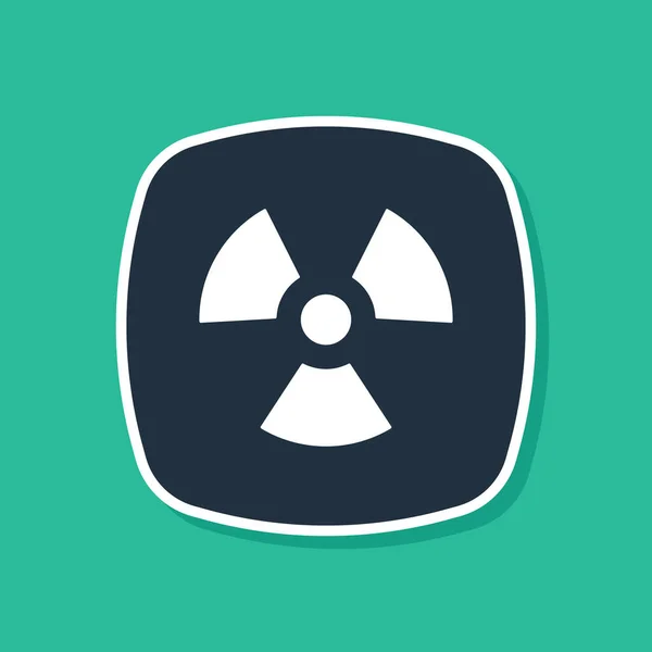 緑の背景に隔離された青の放射性アイコン 放射性毒性記号 放射線危険標識 ベクトル — ストックベクタ