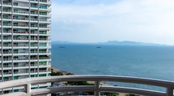 stock image The white terrace of the luxury room of hotels with a sea view in the Pattaya of Thailand. Sea view room and high-take view. The sea in Pattaya