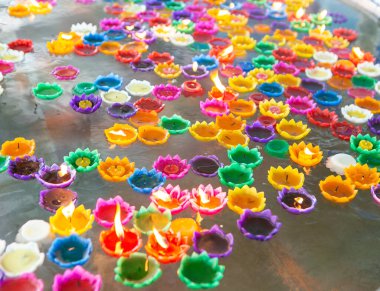 The colorful candlelight for praying from Buddhism in the Thai temple