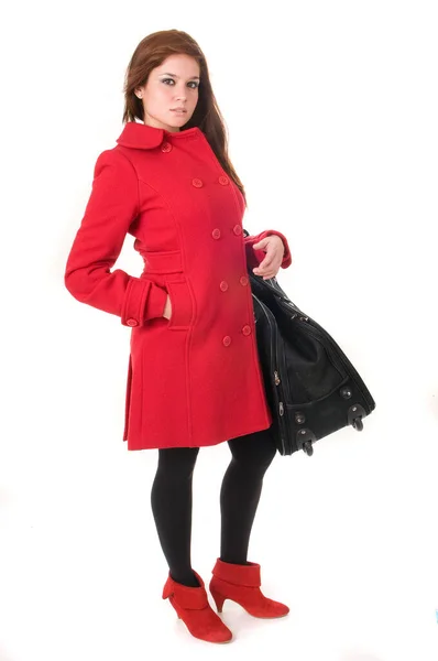Atrakcyjna Kobieta Czerwonym Płaszczu Torbą Lub Walizką Białym Tle — Zdjęcie stockowe