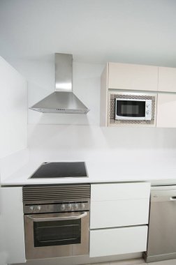 modern kitchen decorated with white appliances