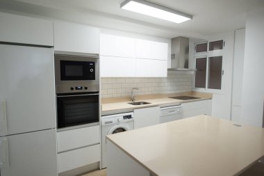 modern kitchen in a house equipped with all its appliances