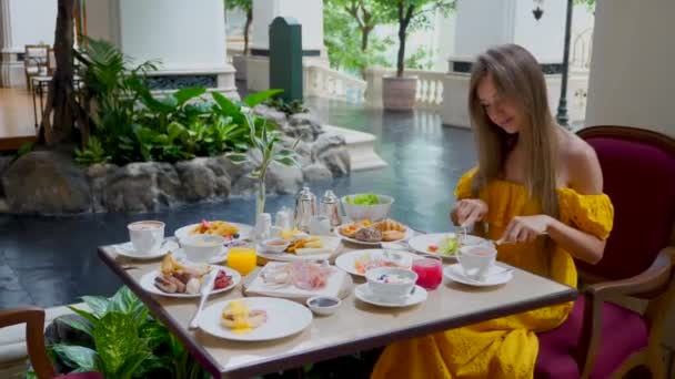 Enjoying Morning Meal High End Hotel Restaurant Woman Eating Sausage — Vídeo de Stock