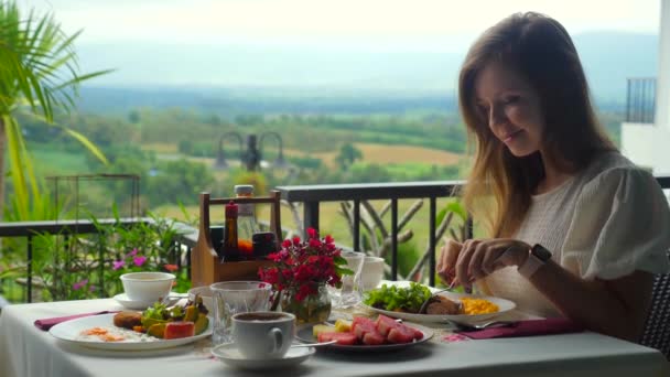 Woman Enjoys Delicious Breakfast Resort Asia Table Full Food Girl — Vídeos de Stock