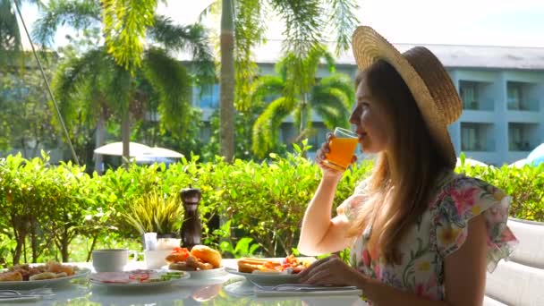 Woman Enjoying Morning Meal Luxurious Tropical Hotel Female Traveler Straw — Stockvideo
