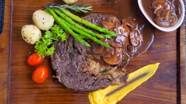 Top View Ribeye Beef Steak Grilled Vegetables Rustic Wooden Board — Stock Video
