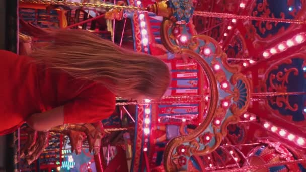 Back View Happy Woman Enjoys Illuminated Merry Carousel Amusement Park — Stock Video