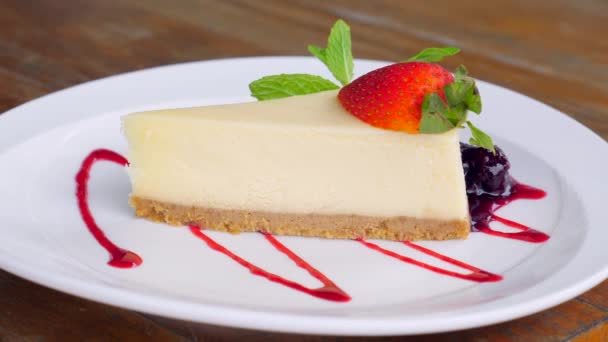 Portion Vanilla Cheese Cake Fresh Strawberry Sauce Served White Plate — Stock Video