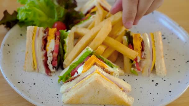Gourmet Club Sandwich White Plate French Fries Wooden Table Cafe — Stock Video