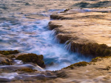 Sunrise'nın deniz kıyısında.