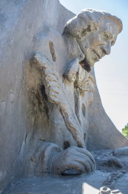 La Albuera, Spain - Jun 12th, 2021: Hans Christian Andersen monument,  representing the author writing The Ugly Duckling. Badajoz, Spain. 