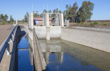 Orellana Irrigation canal in winter. Regulation dam of Vegas Altas del Guadiana, Extremadura, Spain