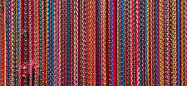 Fly curtains hunging over a doorway. Chain link aluminium curtain