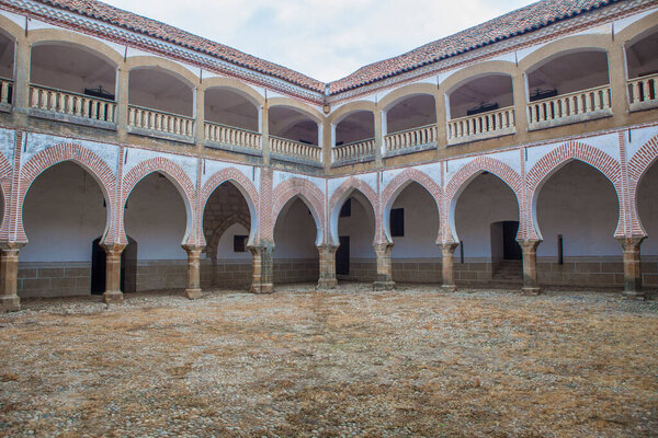 Abadia, Spain - March 5th, 2023: Sotofermoso Palace Mudejar-style courtyard. Abadia, Caceres, Spain