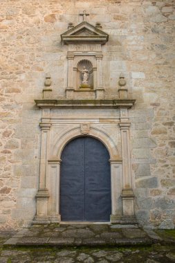 New Chapel facade at El Palancar Convent, Pedroso de Acim, Caceres, Spain clipart
