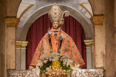 Pamplona, Spain - March 3rd, 2024: San Fermin Patron Saint figure at San Lorenzo Church, Pamplona, Navarra, Spain. Front view clipart
