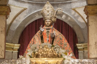 Pamplona, Spain - March 3rd, 2024: San Fermin Patron Saint figure at San Lorenzo Church, Pamplona, Navarra, Spain. Front view clipart