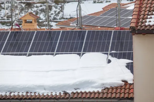 Roof solar panels covered with snow. Solar panels after  snowstorm