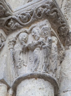 Church of San Miguel portal. Estella-Lizarra town, Navarre, Northern Spain. Presentation of the child in the temple clipart