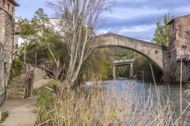 Puente de la Carcel or Medieval Prison Bridge. Estella-Lizarra town, Navarre, northern Spain clipart