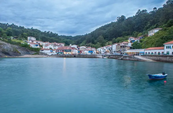 stock image Tazones, one of the most beautiful villages of Asturian Coast, Spain. Town overview seen from breakwaters