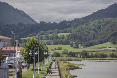 Ribadesella, Spain - July 13th, 2024: Paseo de los Vencedores, one of the better attractions of  Ribadesella, Asturias, Spain clipart