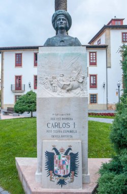 Villaviciosa, Spain- Jul 11th, 2024: Emperor Charles 1st Monument, Villaviciosa, Asturias. Sculpted by Francisco Gonzalez Macias, 1970 clipart