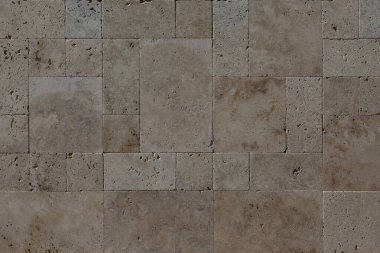 Background of rectangular polished square slabs of natural stone