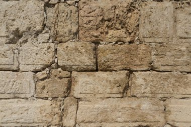 Gerçek antika duvardan taş blokların dokusuna sahip bir arka plan