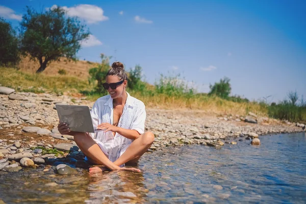 Young Woman Freelancer Traveler Wearing White Shirt Anywhere Working Online Stock Image