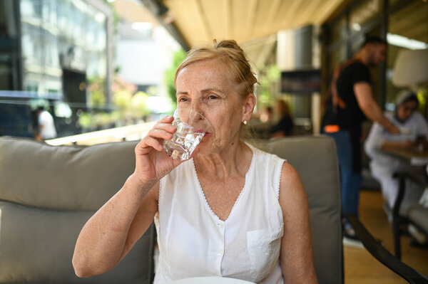Happy Senior Woman Perfect Smile Teeth Glass Still Water Outdoors Royalty Free Stock Images