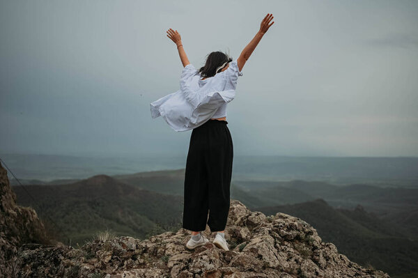 Happy Woman Tourist Hiking Mountain Enjoying Nature Landscape Cloudy Gloomy Stock Image