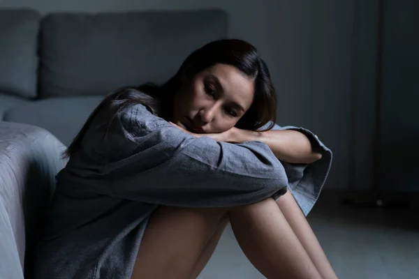 stock image Young Asian woman in bedroom feeling sad tired and worried suffering depression in mental health