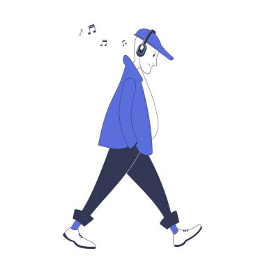 Sokakta yürüyen genç bir adam kulaklıkla müzik dinliyor..