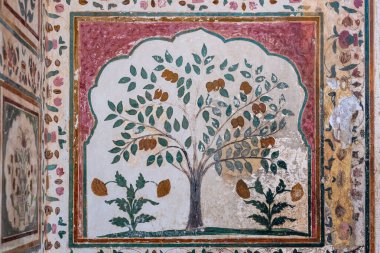 Hindistan. Rajasthan. Jaipur. Amber Kalesi. Ganesh Kapısı 'nın dekorasyon detayları.