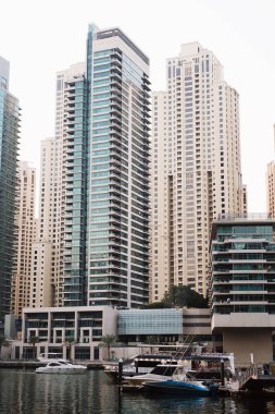 Modern skyscrapers and water pier of Dubai Marina,, United Arab Emirates