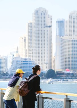 Tourists admiring the skyline of Dubai