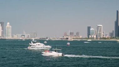 Luxury motor yachts sailing at Persian Gulf. Editorial taken 1 January 2023, Dubai, UAE